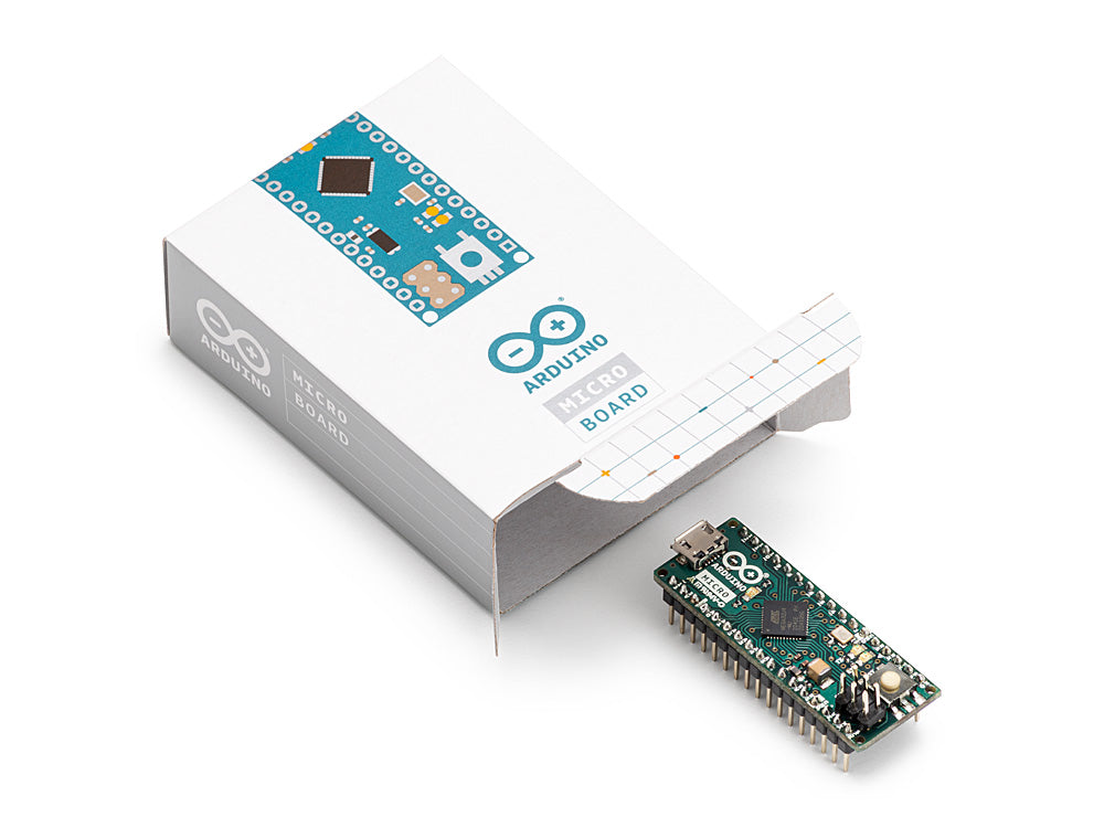 Unboxed Arduino Micro board with headers, displaying the board alongside its packaging.