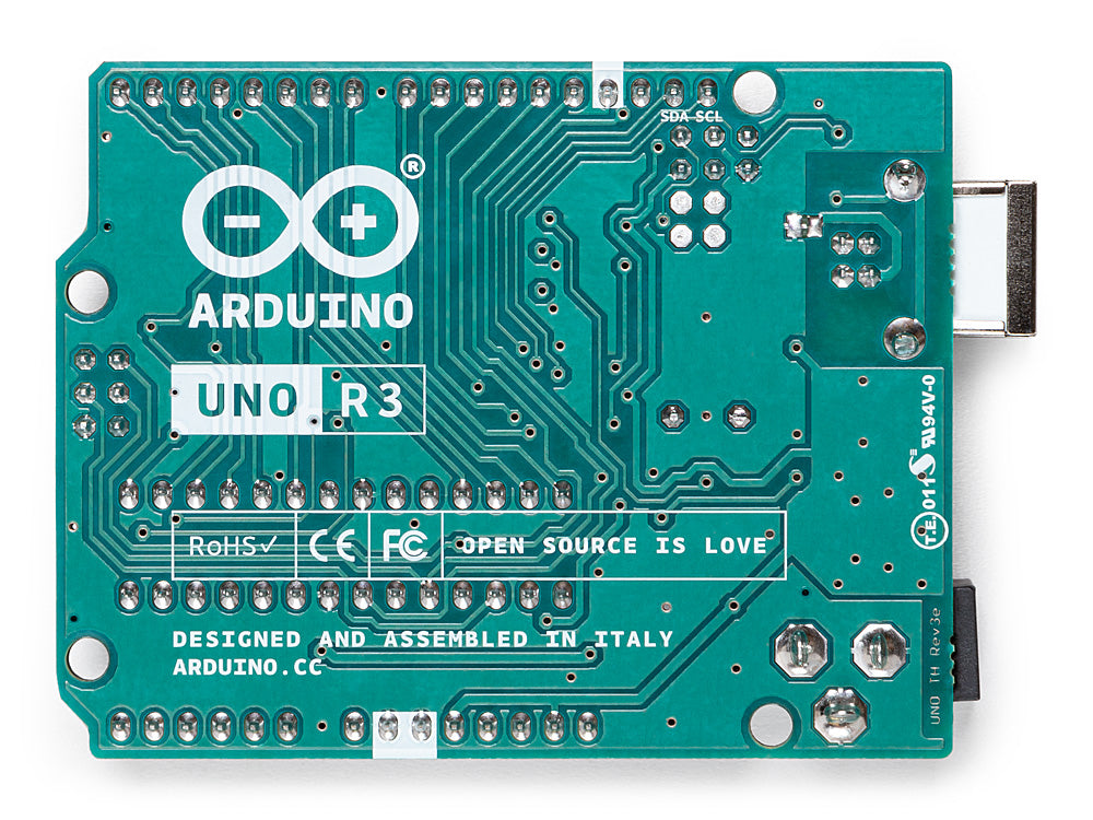 Bottom side of the Arduino Uno Rev3 board, displaying solder points, PCB traces, and component labels.