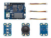 Top-down close-up view of the Arduino UNO Q microcontroller board and Modulino modules, featuring the Qualcomm Dragonwing processor, STM32 MCU, and classic Uno pin headers.