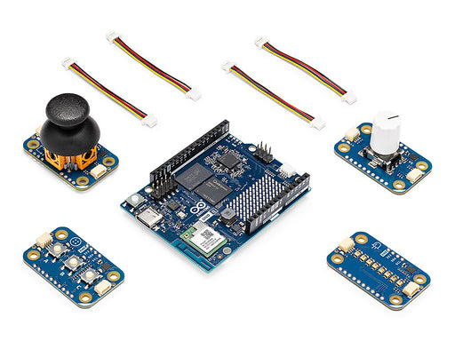 Isometric view of the Arduino UNO Q SBC controller bundle, showing the main board with a joystick, buttons, and Modulino accessory modules and cables.