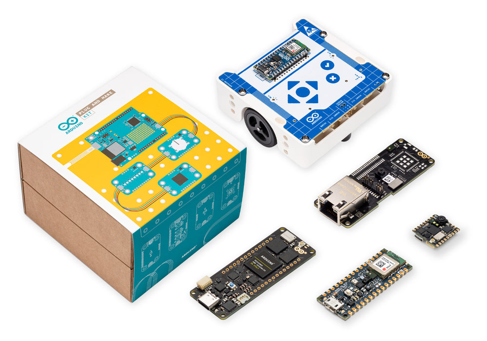 Isometric view of Arduino Plug and Make Kit with multiple electronic boards, including microcontrollers, sensors, and development modules arranged on a white background.